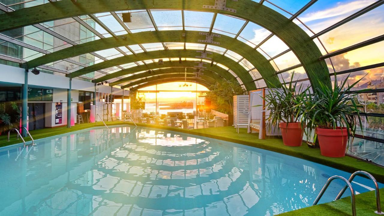 فندق وسبا أريسيف غران أرّاثيفي المظهر الخارجي الصورة The pool at the rooftop