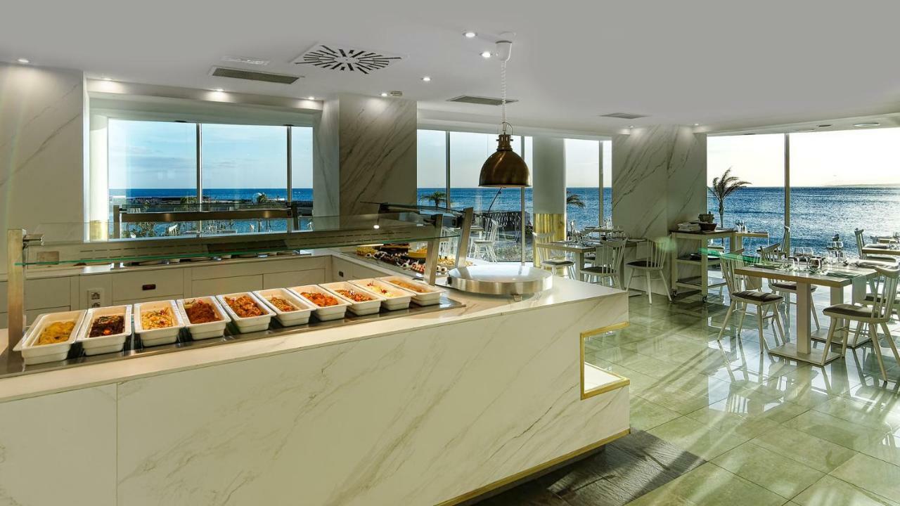 فندق وسبا أريسيف غران أرّاثيفي المظهر الخارجي الصورة The buffet at the hotel